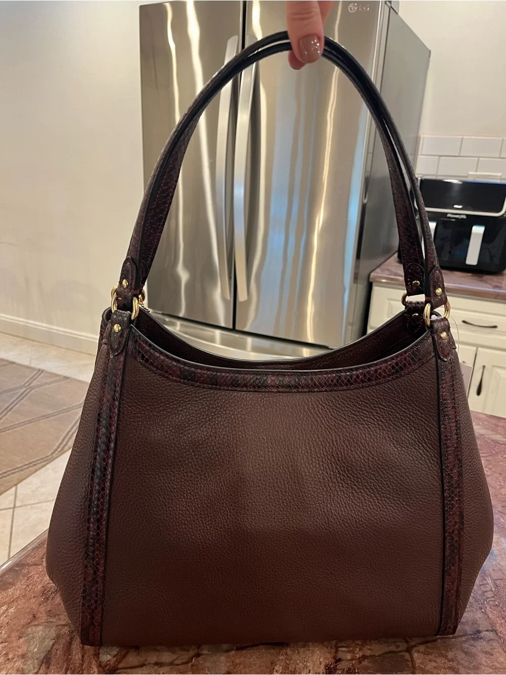 Coach stunning highly